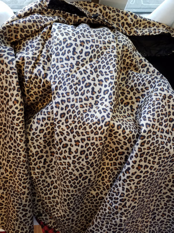 Reversible rain poncho leopard print/black